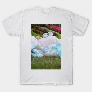 pregnant woman in the park surrounded by stuffed toys T-Shirt